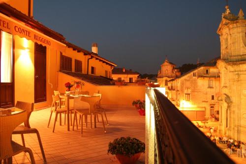Hotel Conte Ruggero - Tap to explore photos