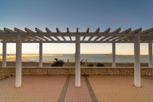 River Playa beachfront apartment large terrace - main image