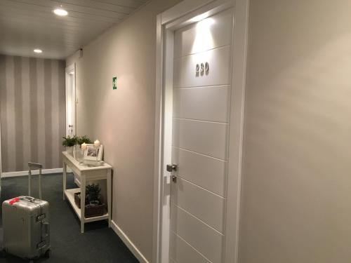 Superior Triple Room room in Suite Erica Lignano Hotel