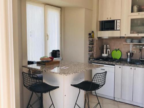  BAV 2+2 Deniz Manzaralı Daire in Bodrum