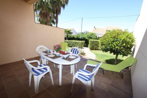 Holiday Home room in Casa Adosada Sol de Azahar by costablancarent
