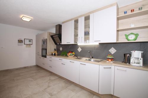 Three-Bedroom Apartment with Balcony and Terrace