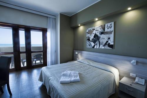 Hotel Scacciapensieri Hotel Scacciapensieri is conveniently located in the popular Nettuno area. The hotel offers guests a range of services and amenities designed to provide comfort and convenience. 24-hour front desk, lu