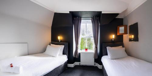 Bazpackers Hostel Room Type - Standard Twin Room with Shared Bathroom