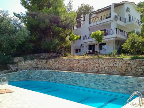 Villa Mc Arthur (Pool, View, Internet, Barbeque) gîte à louer Akraifnía