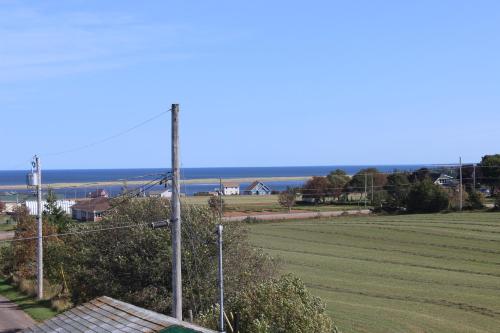 Best Price On Chalets Grand Pre Cottages In North Rustico Pe