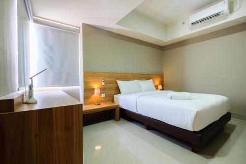 Best Location 1BR Apartment Mustika Golf Residence By Travelio - image 5