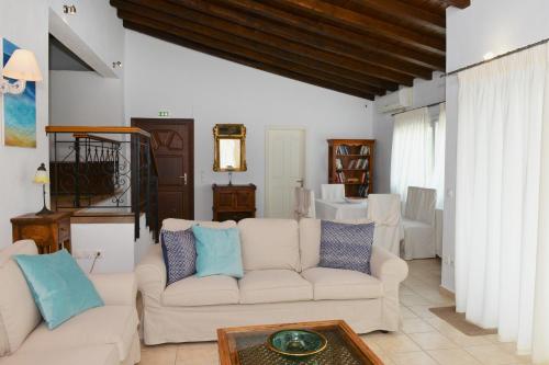 Orestis Suites - Tap to explore photos