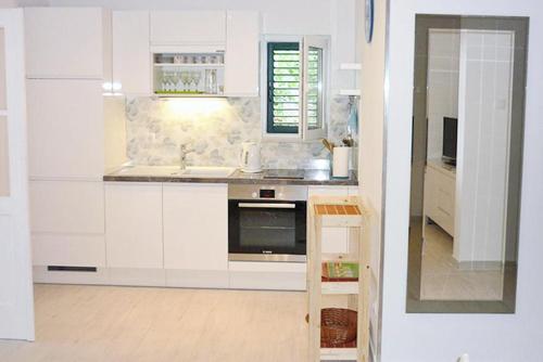 Apartments by the sea Seget Vranjica, Trogir - 1037