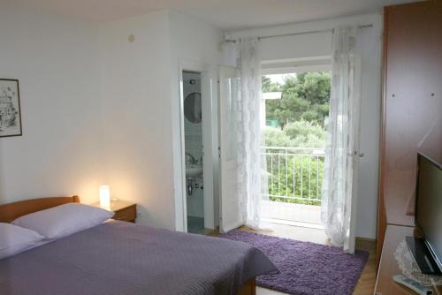 One-Bedroom Apartment with Balcony and Sea View