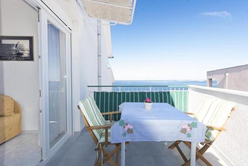 One-Bedroom Apartment with Balcony and Sea View