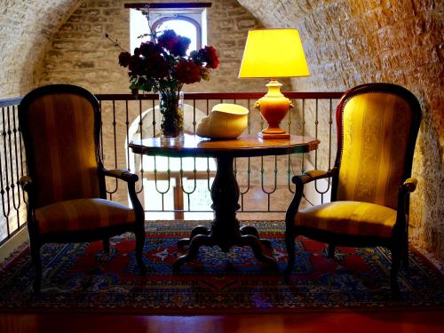gedeelde lounge/tv-ruimte, Relais Ducale in Gubbio