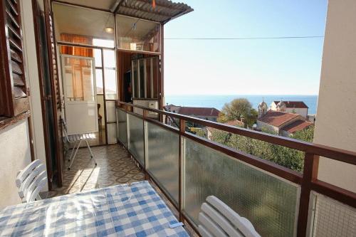 ระเบียง/ชานเรือน, Apartments by the sea Sumpetar, Omis - 9435 in ดูกิ รัต
