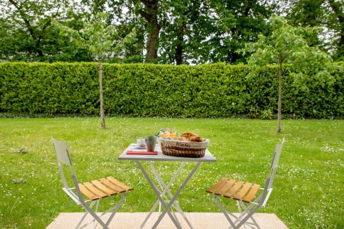 Chic Appartement avec Terrasse, Parking Privatif