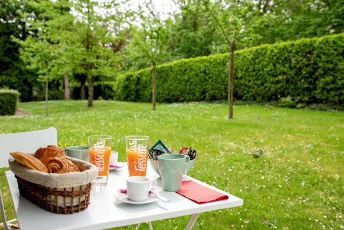 Chic Appartement avec Terrasse, Parking Privatif