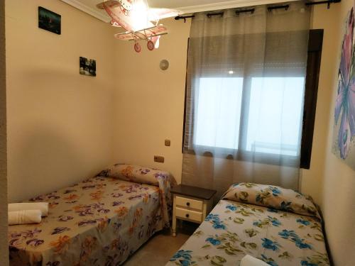 Apartamentos Deluxe San Julian - Tap to explore photos