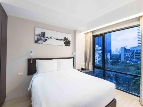 A Hotel Com Maitria Hotel Sukhumvit 18 Bangkok A Chatrium Collection Hotel Bangkok Thailand Price Reviews Booking Contact