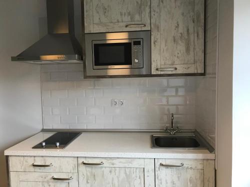 Kitchen, APARTAMENTOS LA LLONGAR in Pilona