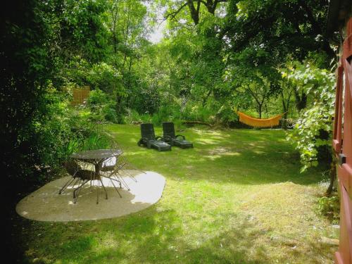 La Chaumière et sa Roulotte gîte à louer Bournissard