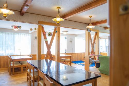 Shared lounge/TV area, Daisen Backpackers in Hoki