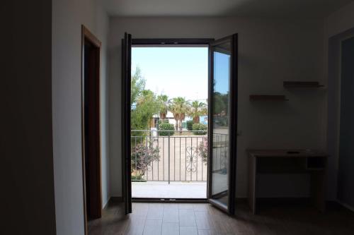 Bed Ponente Room Type - Double Room with Balcony and Sea View Bed Ponente Room Type - Double Room with Balcony and Sea View