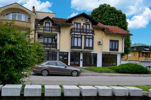 Riverside apartment #1. View over Fortress Kastel in Kocicev Venac