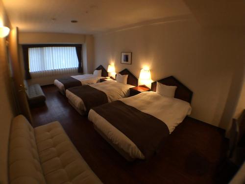 Deluxe Triple Room with Sofa Bed - Non-Smoking 