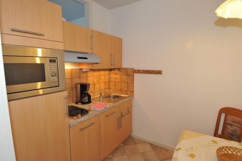 kuchyně, Apartmenthaus am Watt Busum in Busum