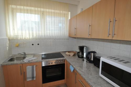 kuchyně, Apartmenthaus am Watt Busum in Busum