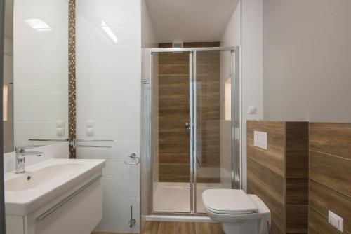 One-Bedroom Apartment room in Szmaragdowa 10 Apartments