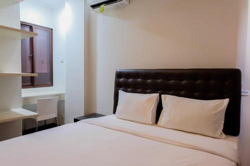 Comfortable Living 1BR at Asatti Apartment By Travelio