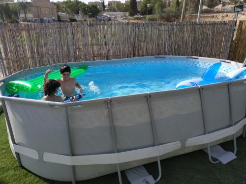 Swimming pool, Akhva Accommodation Unit-אחווה יחידת אירוח in Rishonim