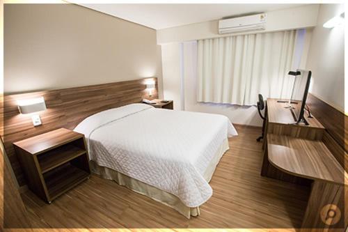 Mogano Business Mogano Business is conveniently located in the popular Chapeco area. Featuring a complete list of amenities, guests will find their stay at the property a comfortable one. Take advantage of the hotel