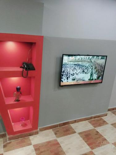 a bathroom with a wall mounted wall mounted wall mounted wall mounted wall mounted wall, North Coast Princess Al Fayrouz in Marsa Matruh