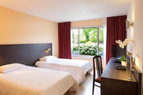 Chambre avec 2 lits
