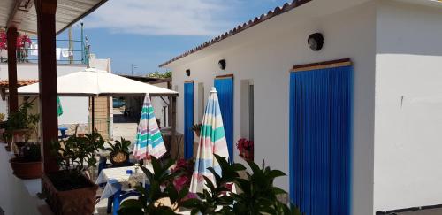 Affittacamere "AL POZZO" chambre d'hôte San Menaio