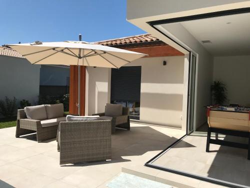 Erkély/terasz, Location villa entre lac et océan avec son spa de nage (Location villa entre lac et ocean avec son spa de nage) in Carcans