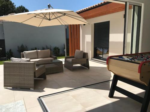 A szálláshely kívülről, Location villa entre lac et océan avec son spa de nage (Location villa entre lac et ocean avec son spa de nage) in Carcans