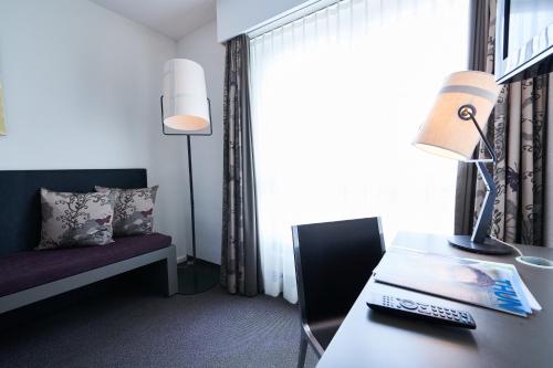 Hotel Holiday Thun, إنترلاكن