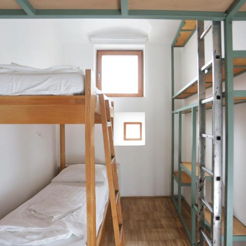 Hostel Celica Room Type - Basic Triple Room with Shared Bathroom