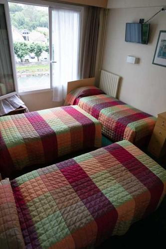 Chambre triple, 3 lits