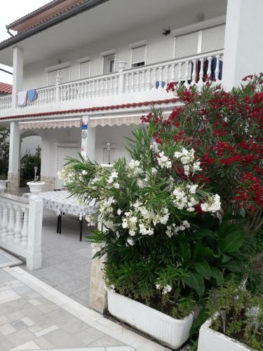 lovely apartments near the town of Rab with Children's pool, playground, garden, parking lot, grill, terraces,