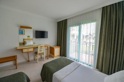 Rebin Beach Hotel Stop at Rebin Beach Hotel to discover the wonders of Fethiye. Offering a variety of facilities and services, the property provides all you need for a good nights sleep. Service-minded staff will welc