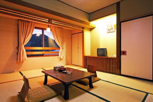 Japanese-Style Room with Tatami Area and Shared Bathroom