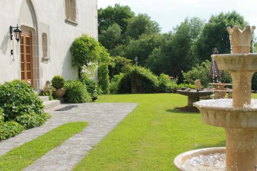 photo chambre Manoir XV Domaine de Peyrafort