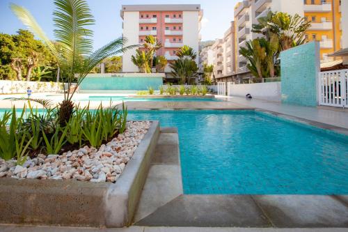 Two-Bedroom Apartment room in Apartamento Ubatuba AR Varanda Gourmet Piscinas e 300mt Praia