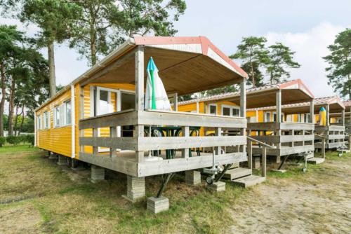 Foto 1: MB Beach Cottage