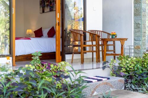 Surya Maha Bungallo Stop at Surya Maha Bungallo to discover the wonders of Bali. Featuring a satisfying list of amenities, guests will find their stay at the property a comfortable one. To be found at the property are fr