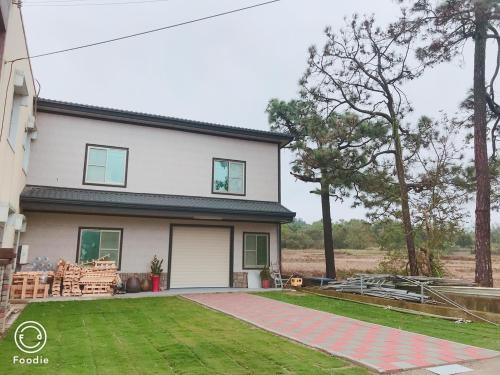 Shinlong Happiness House in Okraj Tongluo