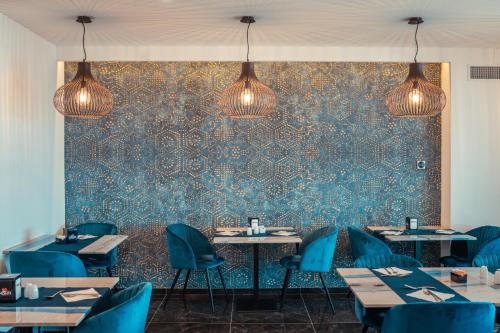 餐廳, Nautilus Hotel in 賈爾迪尼奈克索斯市中心